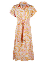 The Finley Tara shirt dress, a short sleeved 100% cotton maxi shirt dress with an orange floral tropical pattern.