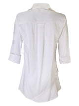 A rear view of the Finley Jenna dress, a white button-down shirtdress with bias flounce accents and a relaxed fit.