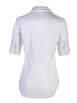 A rear view of the Finley Endora shirt, a white short-sleeve shirt with a half-zip collar and a semi-tailored fit.