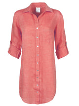 A front view of the Finley Alex dress, a peach pink washed linen button-down shirt dress with tabbed sleeves and a relaxed fit.