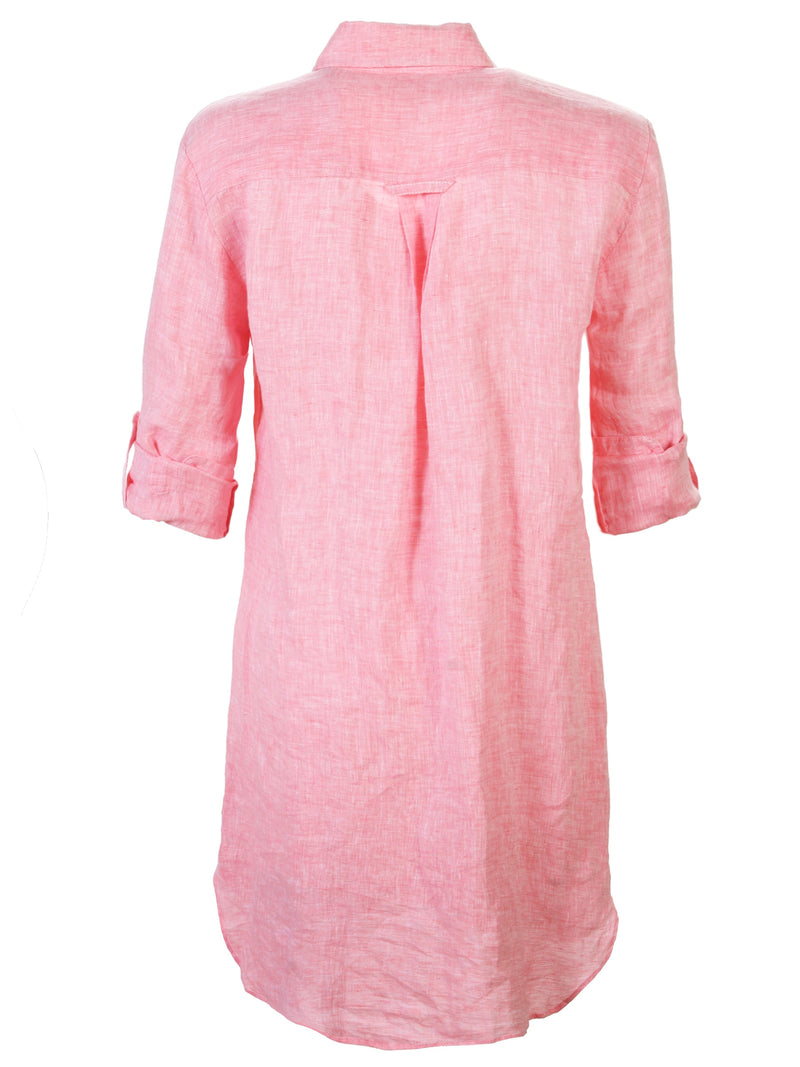 A back view of the Finley Alex dress, a peach pink washed linen button-down shirt dress with tabbed sleeves and a relaxed fit.