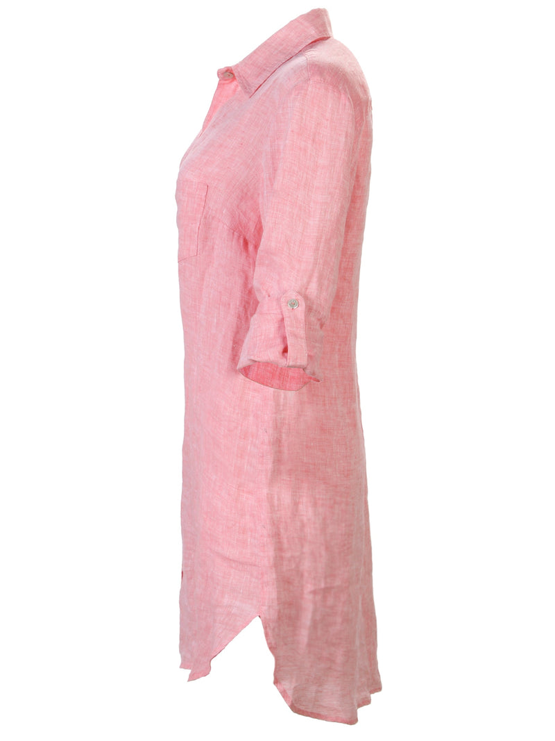 A side view of the Finley Alex dress, a peach pink washed linen button-down shirt dress with tabbed sleeves and a relaxed fit.