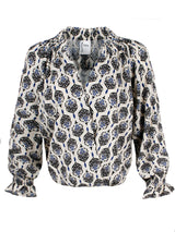 A front view of the Finley Brette blouson, a ruffled long sleeve blouse with a v-neckline and a vintage medallion print.
