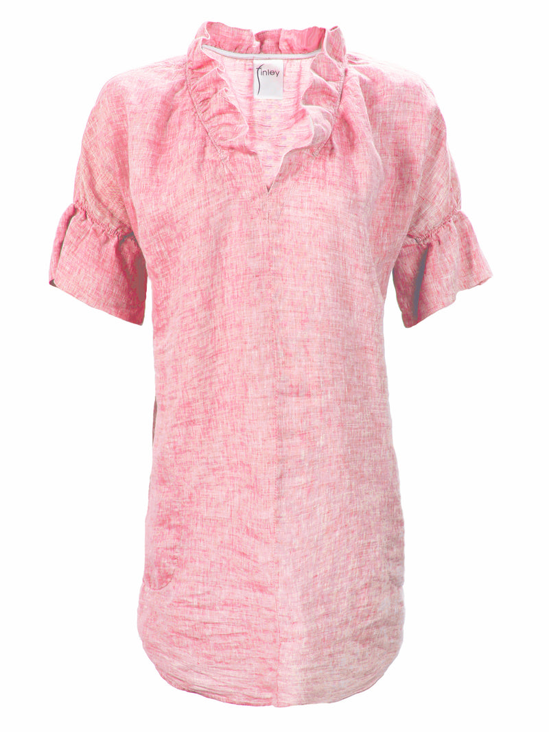 A front view of the Finley Crosby shirt dress, a washed linen dress with ruffled sleeves and collar and a coral pink color.