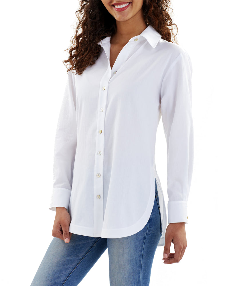 A fashion model wearing the Finley boyfriend shirt, a cotton voile button-down blouse with a relaxed fit and a rose red color.