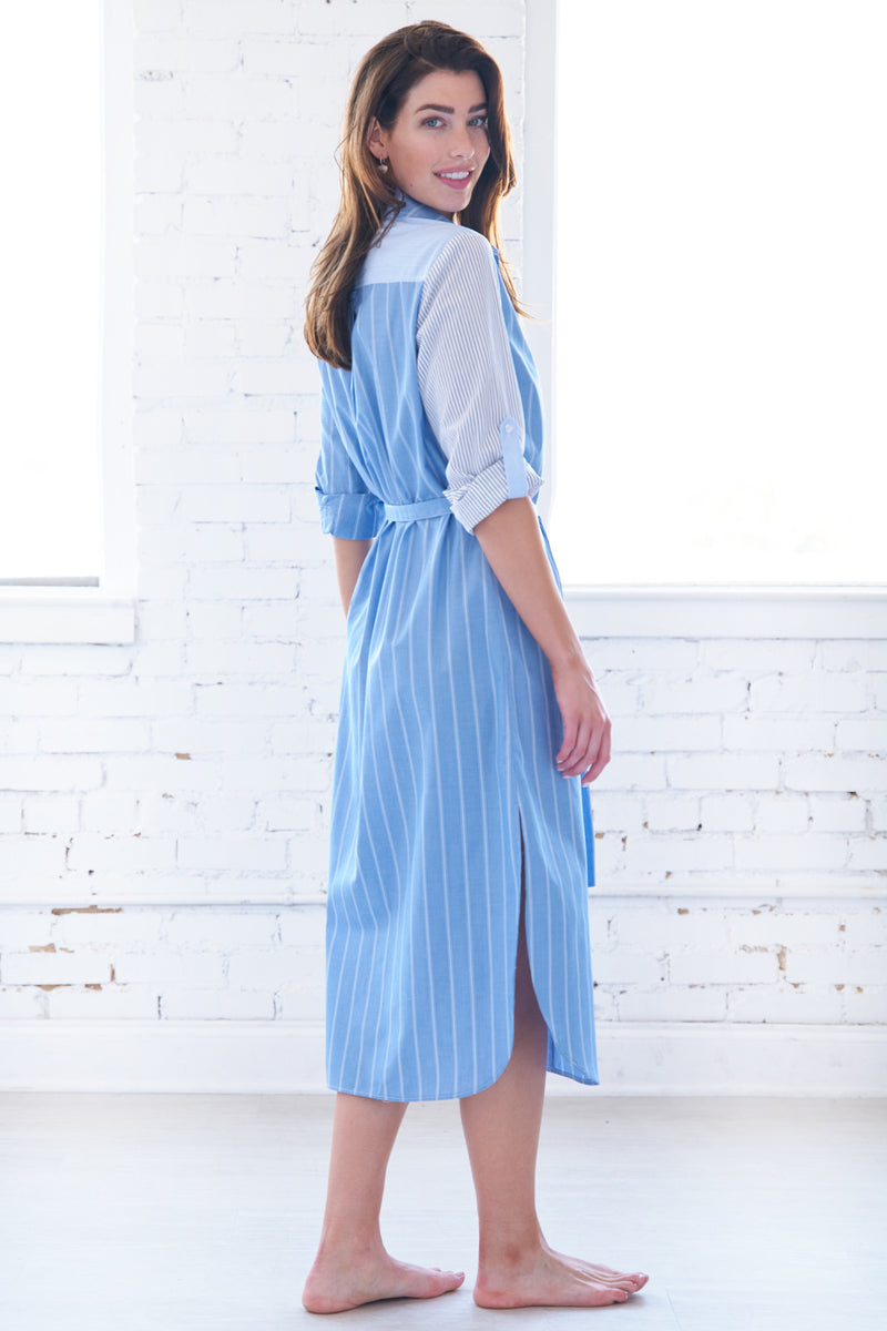 The finley Alex dress, a button up tie-front maxi dress with long sleeves and a blue and white striped colorblock pattern.