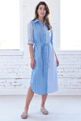 The finley Alex dress, a button up tie-front maxi dress with long sleeves and a blue and white striped colorblock pattern.