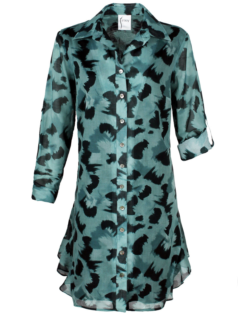 The Finley Agatha dress, a cotton voile button down midi shirt dress with a ruffle hem and a teal and black floral pattern.