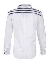 The Finley Alex blouse, a button down women's shirt with embroidered blue and white stripes and a semi-fitted shape. 