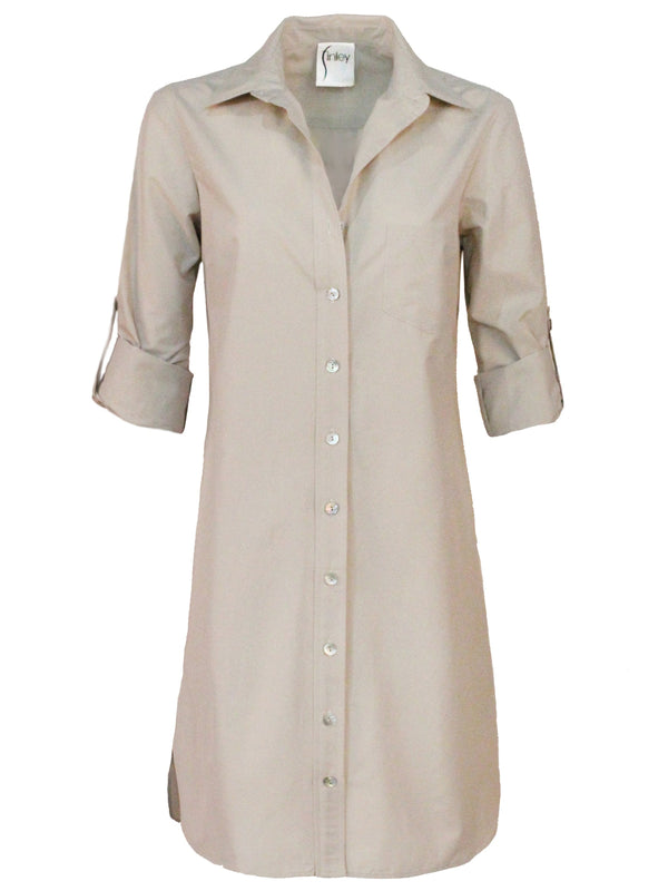 The Finley Alex shirt dress, a button down light tan shirt dress with long barrel cuff sleeves, a chest pocket, and a relaxed fit.