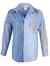 The Finley boyfriend shirt, a color-blocked blue and white striped shirt with an asymmetric pocket.