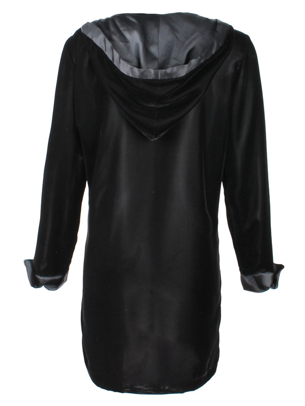 A rear view of the Finley Whisperweight Dress, a black velvet dress with a black hood, black satin trim, and a v-neckline.