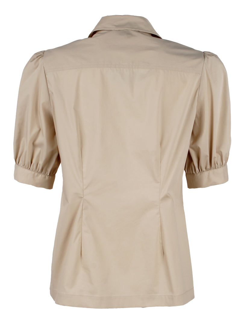 The Finley camp shirt, a white button down weathercloth blouse with chest pockets, short puff sleeves, and a relaxed fit.
