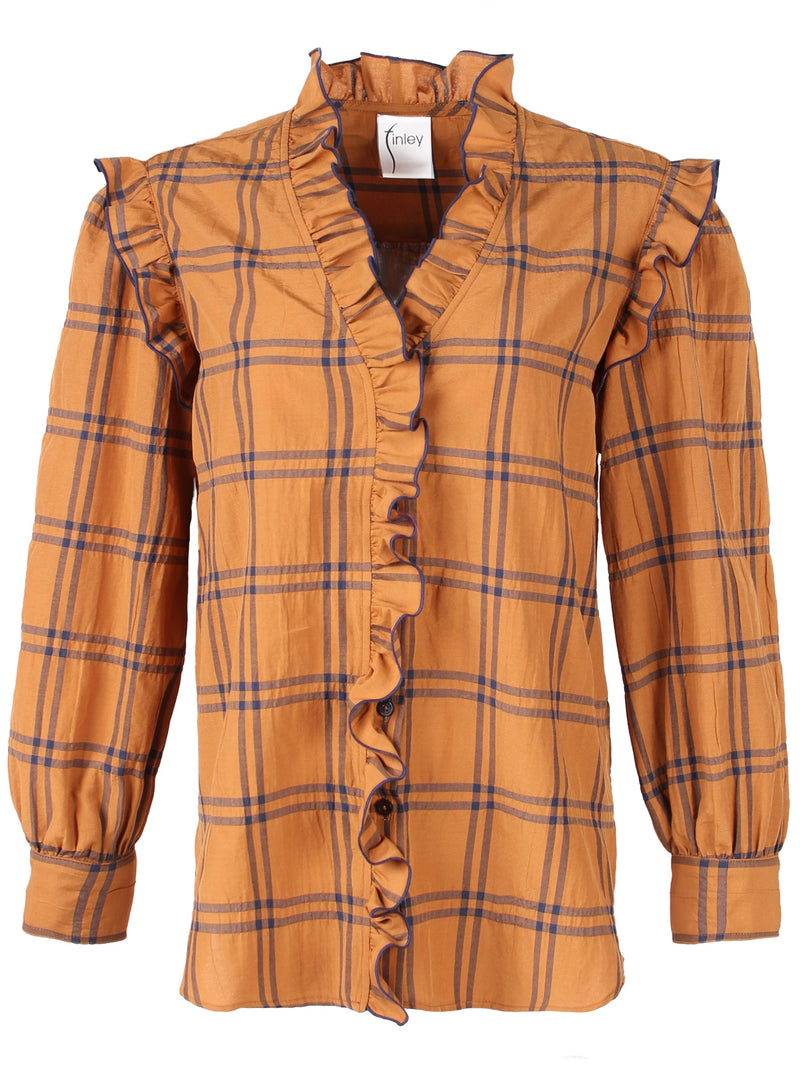 A rear view of the Finley Byrdee blouse, a long sleeve button down top with ruffle trim and an orange and black plaid print.