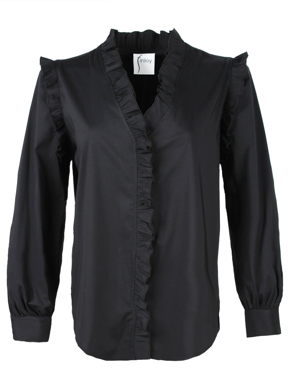A front view of the Finley Byrdee blouse, a long sleeve black poplin top with ruffled trim, tonal piping, and a v neckline.