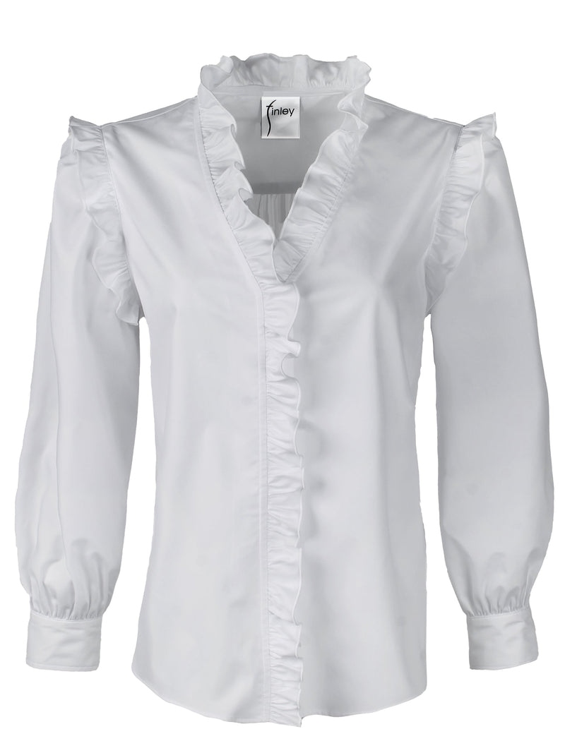A front view of the Finley Byrdee blouse, a long sleeve white poplin top with ruffled trim, tonal piping, and a v neckline.