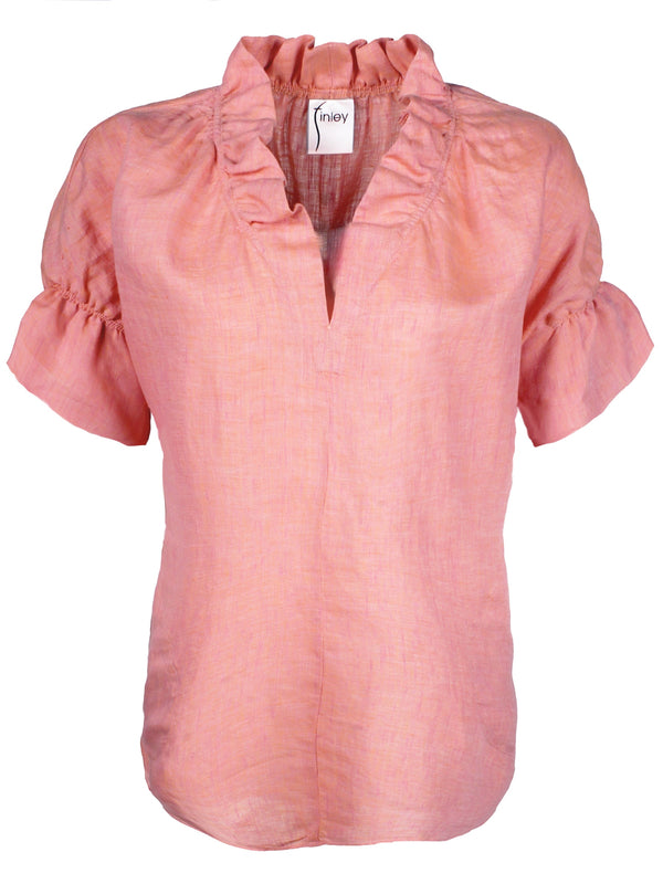 The Finley Crosby blouse, a peach pink short-sleeve casual washed linen blouse with a ruffle collar and relaxed fit.