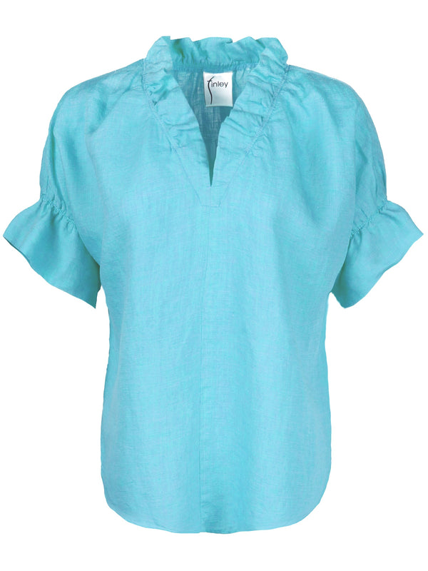 The Finley Crosby blouse, a Caribbean blue short-sleeve washed linen blouse with ruffle collar detail and relaxed fit.