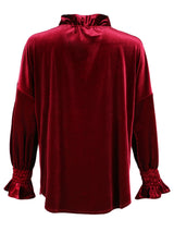 A rear view of the Finley Crosby blouse, a burgundy red whisperweight velvet top with a v-neck and ruffle detailing.