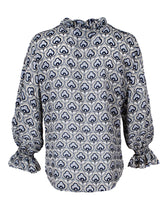 The Finley Crosby blouse, a 100% viscose button up blouse with puff sleeves, a ruffle collar, and a silver gray cloud pattern.