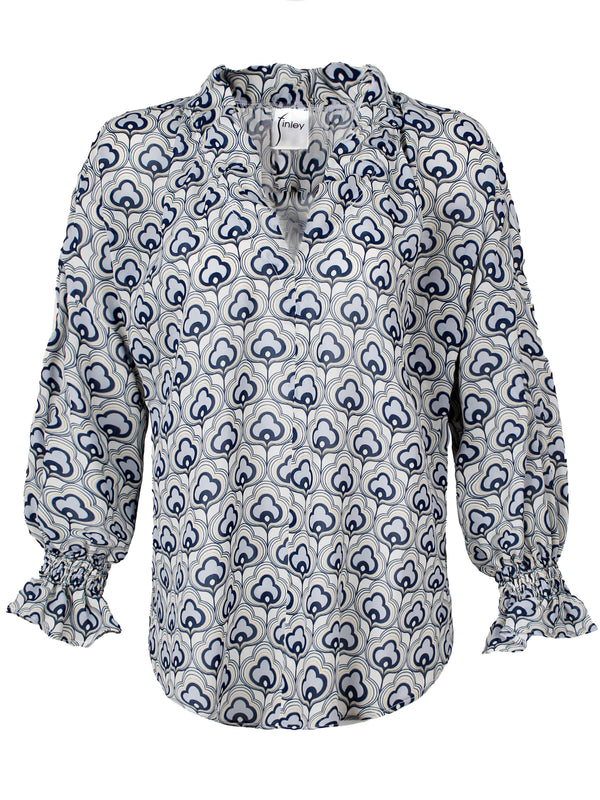 The Finley Crosby blouse, a 100% viscose button up blouse with puff sleeves, a ruffle collar, and a silver gray cloud pattern.