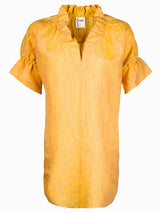 A front view of the Finley Crosby dress, a ruffle-sleeve washed linen dress with pockets and a bright yellow color.