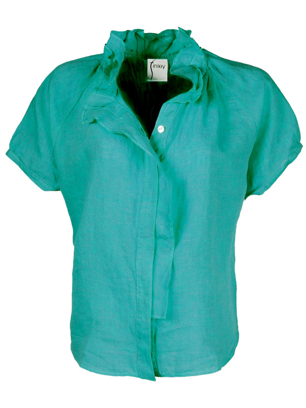 The Finley Frankie blouse, a jade green short sleeve washed linen blouse with a ruffle collar and a relaxed shape.