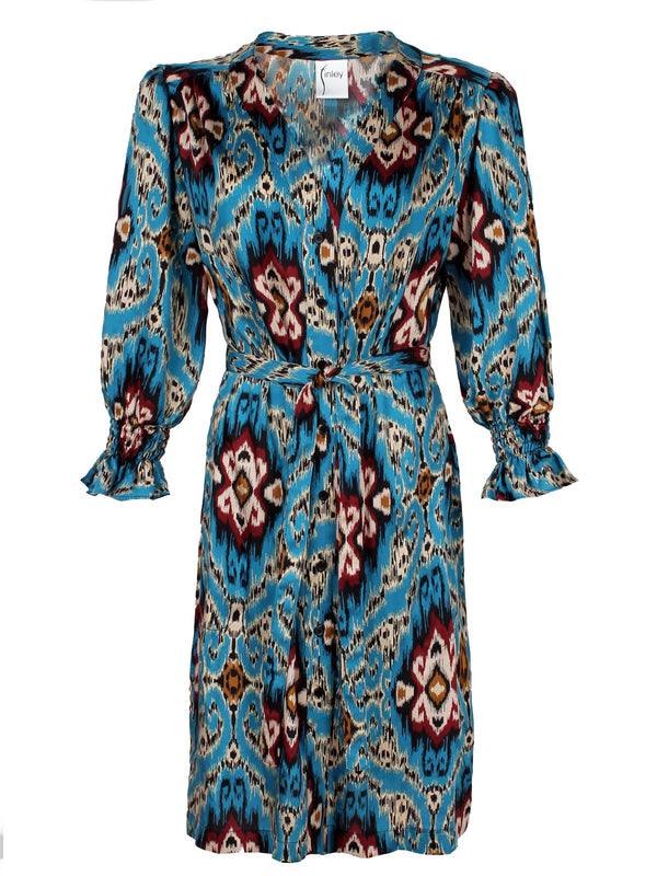 A front view of the Finley Helena dress, a slipover midi shirt dress with 3/4 sleeves and an abstract teal blue print.