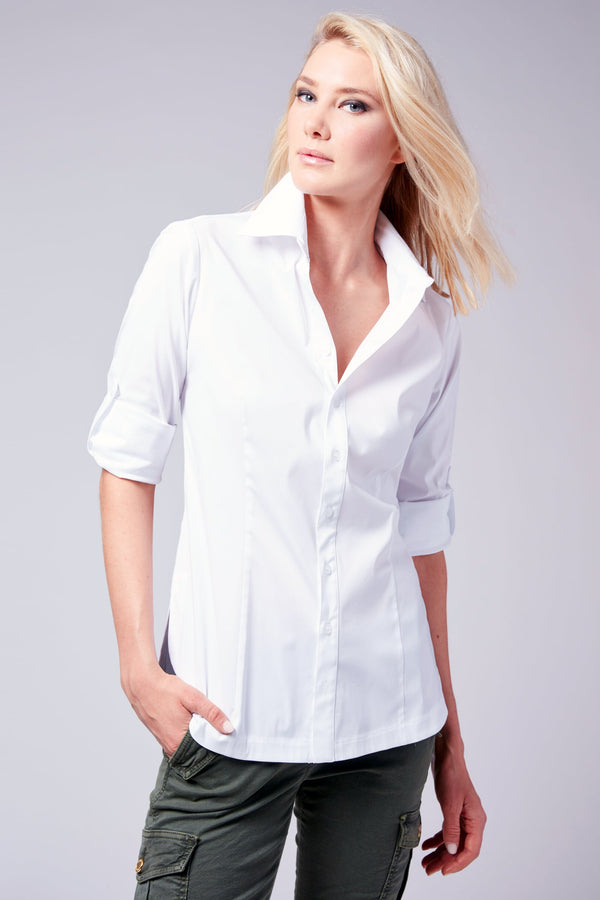 A blonde model wearing the Joey poplin, a white button-down blouse with a tailored fit and tabbed sleeves.