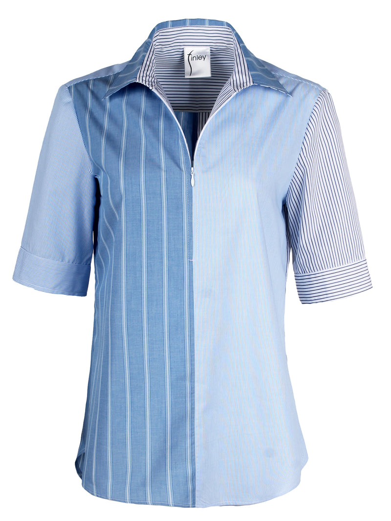 The Finley Endora blouse, a blue and white striped cotton half-zip popover blouse with a colorblock pinstripe pattern.