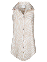 A front view of the Finley Shelly blouse, a button-down sleeveless shirt dress with a brown and white zebra print.